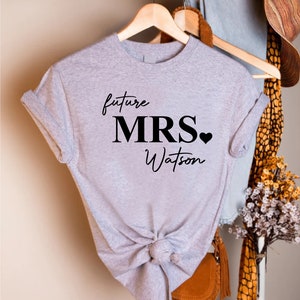 a t - shirt that says future mrs nation hanging on a rack