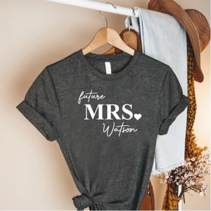 a couple of shirts that are on a rack