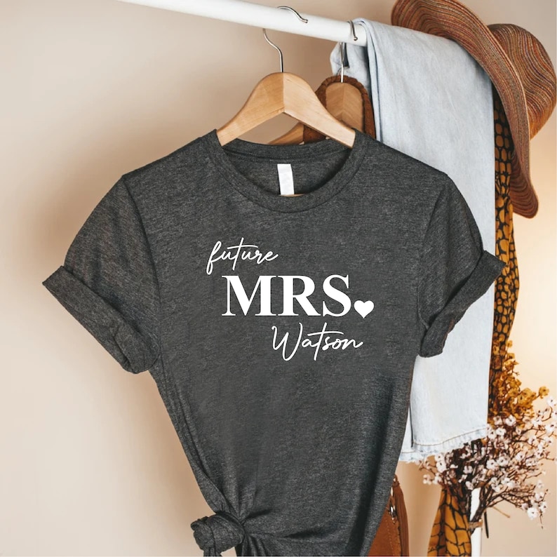a couple of shirts that are on a rack