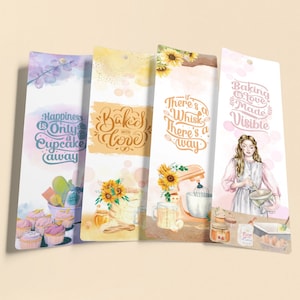 May include: Four colorful bookmarks with watercolor illustrations and inspirational quotes about baking. The bookmarks feature sunflowers, a kitchen mixer, cupcakes, and a woman baking. The quotes are "Happiness is only a cupcake away", "Baked with love", "There's a whisk, there's a way", and "Baking with love made visible".