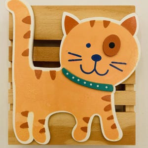 オレンジの子猫コースター