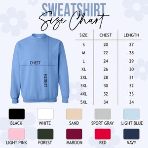 May include: A light blue sweatshirt with a size chart. The chart lists chest and length measurements for sizes S through 5XL. Color options include black, white, sand, sport gray, light blue, light pink, forest, maroon, red, and navy.
