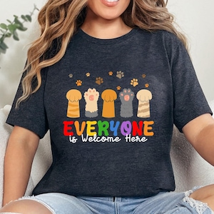 Everyone Is Welcome Here Cat Paws Shirt, Idaho Teacher Shirt ,Inclusion And Equality Tshirt, Protest And Resist Tshirt, Teacher Shirt