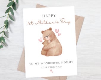 May include: A white card with a brown bear hugging a smaller brown bear. The card says "Happy 1st Mother's Day" and "To my wonderful mommy Love from Nico".