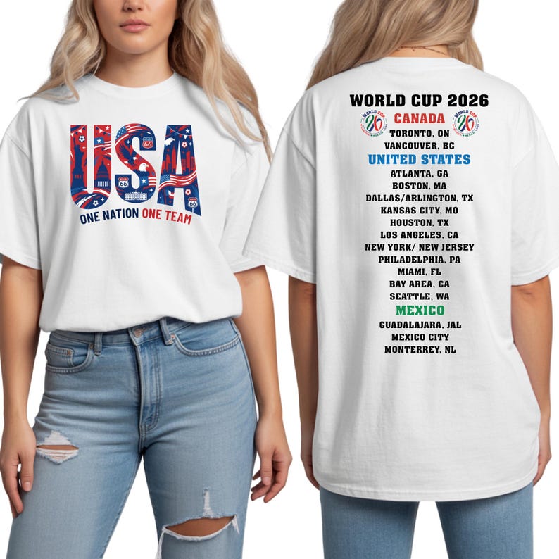 A white t-shirt with text and graphics related to the World Cup, featuring the text "USA" and a list of cities in the United States.