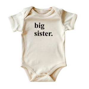 Cute Pregnancy Announcement Baby Bodysuit • Big Sister Onesie® • Natural Color Baby Clothing With Black Ink • Printed in USA
