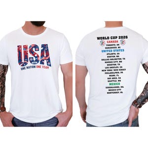 a white t-shirt with text and graphics related to the World Cup of 2026.