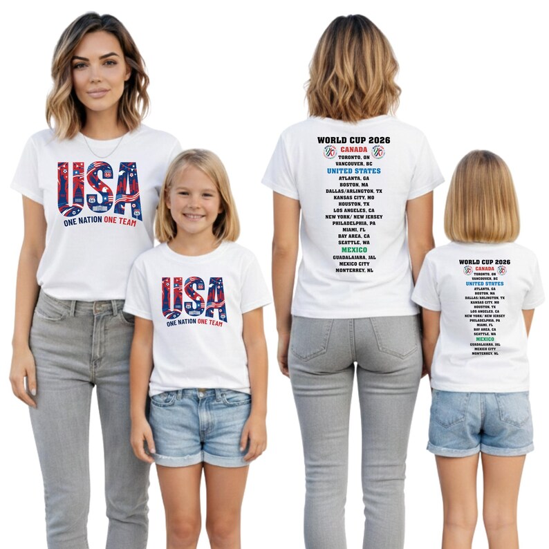 two women and two young girls wearing white t-shirts with the text "USA ONE NATION ONE TEAM" printed on them.