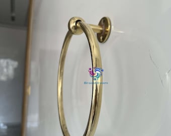 Toallero redondo de pared para baño, de latón macizo sin lacar.