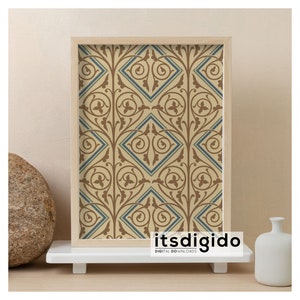 May include: A framed print of a beige and blue geometric pattern with a repeating design of stylized leaves and diamonds. The frame is a light wood color. The print is on a white shelf with a round stone and a white vase.