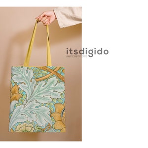 Puede incluir: Una bolsa de tela amarilla con un patr&oacute;n floral en azul, verde y amarillo. El patr&oacute;n recuerda a un dise&ntilde;o de papel tapiz vintage. La bolsa tiene un asa amarilla.