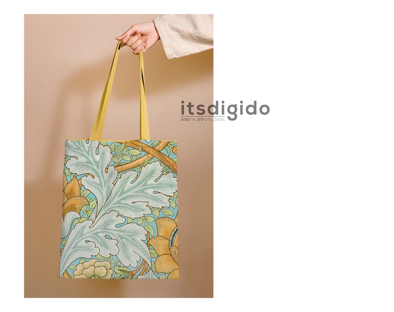 Puede incluir: Una bolsa de tela amarilla con un patr&oacute;n floral en azul, verde y amarillo. El patr&oacute;n recuerda a un dise&ntilde;o de papel tapiz vintage. La bolsa tiene un asa amarilla.