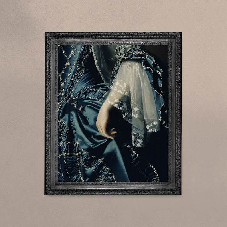 May include: A framed painting of a woman wearing a blue and gold dress with a white lace sleeve. The painting is in a dark wood frame.