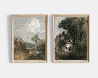 May include: Two framed landscape paintings in a light wood frame. The painting on the left shows a rural scene with a cloudy sky, trees, and a path leading to a small house. The painting on the right shows a house with a large tree in front of it.