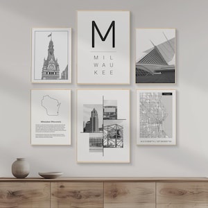 May include: A set of black and white prints featuring various aspects of Milwaukee, Wisconsin. The prints include a city skyline, a map, a building, and the word "Milwaukee" spelled out with the letter "M" in a large font.