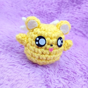 Amigurumi de león alado, anime y manga, muñeco de ganchillo inspirado en el animal guardián de la cazadora de cartas, hecho a mano para fans