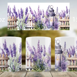 May include: Two white ceramic mugs with a lavender, fence, and lantern design. The mug on the left has a 11 oz label and the mug on the right has a 15 oz label.