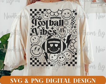 May include: Black and white graphic design featuring a football with a smiley face and the text "Football Vibes". The design is surrounded by various smiley faces, stars, and lightning bolts.