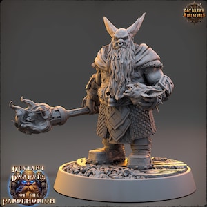 May include: A gray, detailed miniature of a dwarf warrior holding a torch and a dragon head. The dwarf is wearing chainmail armor, a cloak, and has a long beard. The miniature is standing on a circular base.