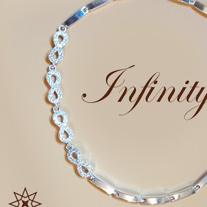 Eternal Elegance: Silver Bracelet Adorned with Diamond-Inspired Infinity Symbols
