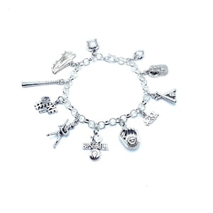 May include: A silver charm bracelet with baseball-themed charms, including a baseball glove, bat and ball, a baseball cap, a player running, and a charm that says "I love baseball".