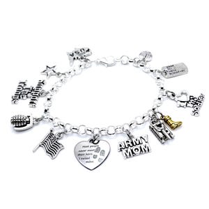 May include: A silver charm bracelet with various military-themed charms. Charms include a USA map, star, American flag, Army Mom, heart with text, boots, and a dog tag. The bracelet is on a white background.