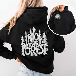 Step into the wild with the Into The Forest hoodie, where style meets nature in the most unforgettable way.