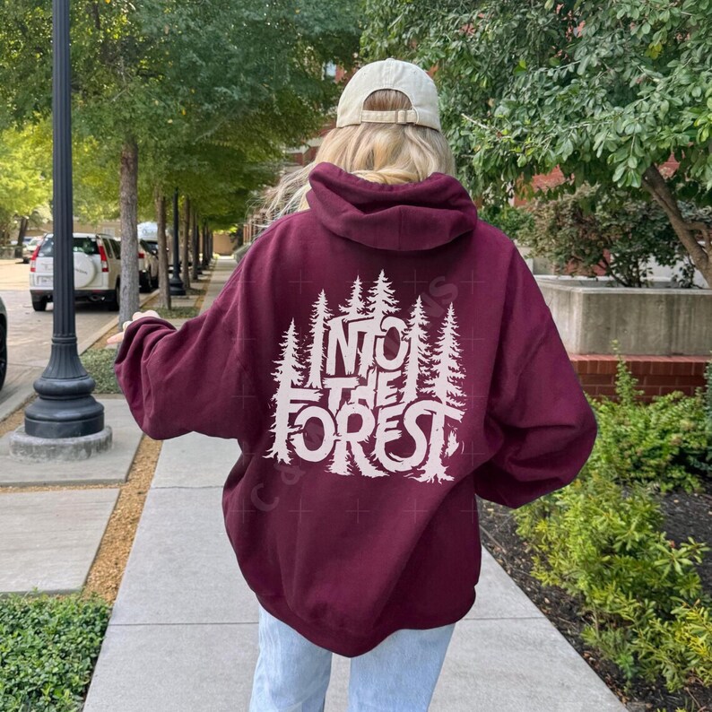 Step into the wild with the Into The Forest hoodie, where style meets nature in the most unforgettable way.