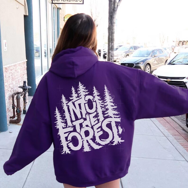 Step into the wild with the Into The Forest hoodie, where style meets nature in the most unforgettable way.