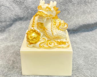 Hand-Carved Ivory Nut Dragon Seal Figurine: Golden Oriental Decor