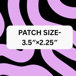 May include: A white rectangle with the text "PATCH SIZE - 3.5"x2.25"" is centered on a background of swirling black and light purple shapes. The patch dimensions are 3.5 inches by 2.25 inches.
