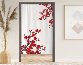 May include: White room divider with a floral design featuring red cherry blossoms on a white background. The room divider is made of fabric and has a wooden frame.