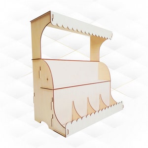May include: A wooden stand with three shelves and a scalloped roof. The stand is made of light wood and has a natural finish.