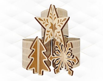 May include: Set of four wooden napkin rings with a Christmas theme. The rings are decorated with a star, a snowflake, and two Christmas trees.
