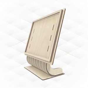 Può includere: Un espositore in legno con una cornice rettangolare e una base curva. L'espositore è realizzato in legno chiaro e ha una finitura naturale.