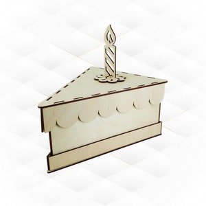 May include: A wooden cake box shaped like a slice of cake with a candle on top. The box is made of light wood and has a scalloped edge. The candle is white with red stripes and a flame on top.