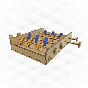 Pode incluir: Um jogo de futebol de mesa de madeira com jogadores laranja e azuis. O jogo tem duas alças de madeira com botões nas extremidades.