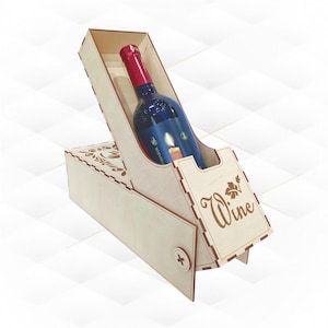 Puede incluir: Una caja de vino de madera con una tapa con bisagras y un hueco para una botella de vino. La caja está decorada con un diseño de vid y hojas y la palabra "Vino" está grabada en la parte delantera.