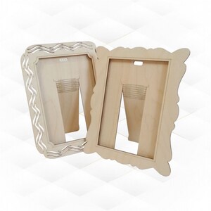 May include: Two wooden picture frames. One frame has a wavy design on the left side, while the other has a scalloped edge. Both frames have a stand on the back.