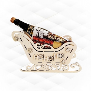 Traîneau de Noël cadeau, support pour boîte à vin, design découpé au laser. Image vectorielle découpée au laser, motif de Noël, voeux de Noël. Conception ho-ho-ho, modèle coupé