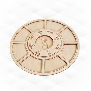 May include: A wooden game board with eight sections labeled with playing card values and suits, including Jack, Queen, King, Ace, 10, 9-10, 8-9, and 7-8. The center of the board has a circle labeled "POT".