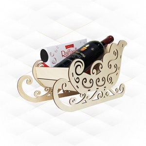 Trineo navideño de regalo, porta vino, diseño cortado a láser. Plantilla cortada a láser, archivos SVG y DXF, trineo navideño. Decoración navideña.