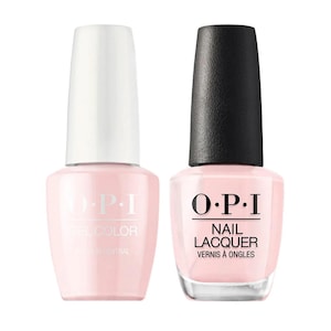 May include: Two bottles of O.P.I. nail polish. The bottle on the left is labeled "GelColor" and the bottle on the right is labeled "Nail Lacquer". Both bottles are a light pink color.