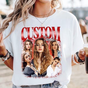 May include: White sweatshirt featuring a graphic design with the text "CUSTOM Text" in red. The design includes multiple images of a woman with long hair. The sweatshirt is a casual style.