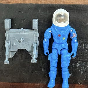 Carga útil del astronauta estadounidense estilo vintage GI Joe Black Major
