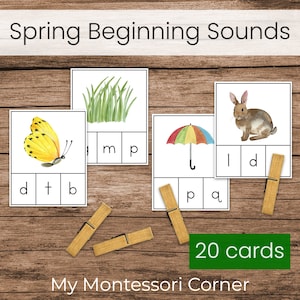 May include: A set of 20 printable cards featuring spring-themed images, such as a butterfly, grass, an umbrella, and a rabbit. Each card has three blank boxes for children to match the beginning sound of the image.