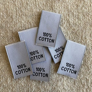 Woven Damask (100% Cotton) Clothing Fabric Content Label - White w/black text