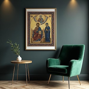May include: A framed religious icon with gold accents, depicting figures in traditional attire. The artwork is set against a dark teal wall, complemented by a green velvet armchair and a small wooden side table with gold legs. The room has a warm, inviting atmosphere.