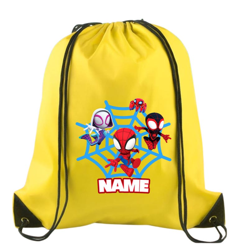 May include: Yellow drawstring backpack featuring Spider-Man characters. The design includes Spider-Man, Spider-Gwen, and Miles Morales, with a blue web and the word "NAME" in a red and white box. Black drawstrings and black accents complete the design.