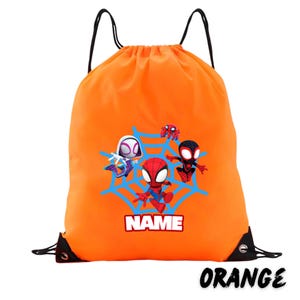 May include: Orange drawstring backpack featuring a Spider-Man design with three characters on a blue web. The word "NAME" is printed in white, and the word "ORANGE" is printed at the bottom. Black drawstrings and corner accents complete the design.